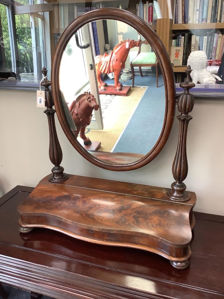 A Victorian mahogany toilet mirror, with hinged box base, width 72cm height 86cm
